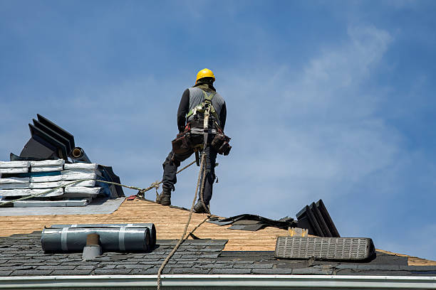 Professional Roofing technician working in Southbridge, MA